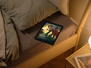 Goodnight AI on an iPad resting on a bed